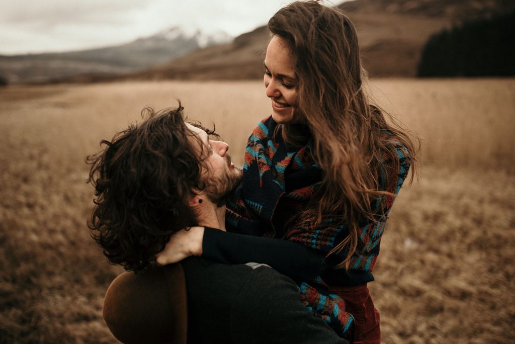 Wedding photographer Scotland love session isle of skye windy shot